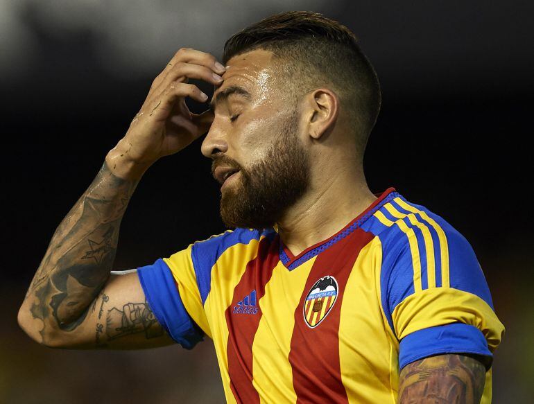 VALENCIA, SPAIN - AUGUST 08:  Nicolas Otamendi of Valencia reacts as he fails to score during the pre-season friendly match between Valencia CF and AS Roma at Estadio Mestalla on August 8, 2015 in Valencia, Spain.  (Photo by Manuel Queimadelos Alonso/Getty Images)