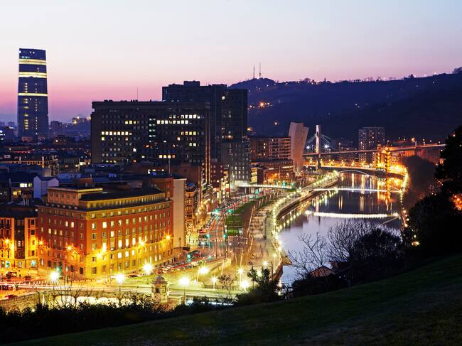 View of Downtown Bilbao at sunset from Extebarria Parkea