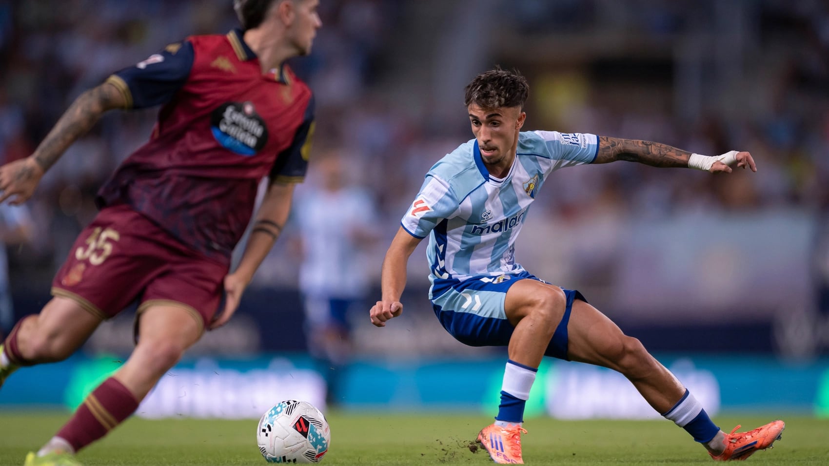 El centrocampista del Málaga David Larrubia, se encuentra lesionado