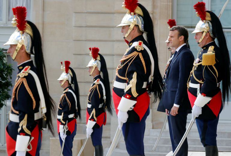 French President Emmanuel Macron waits for guests to leave at the Elysee Palace in Paris, France, June 12, 2017.