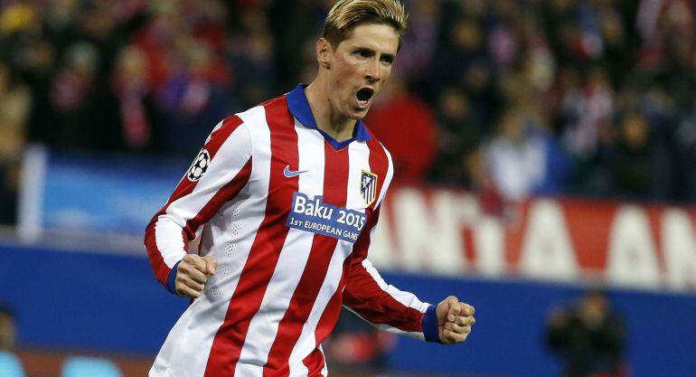 Atletico Madrid&#039;s Fernando Torres celebrates after scoring during a penalty shootout against Bayer Leverkusen during their Champions League Round of 16 second leg soccer match at the Vicente Calderon stadium in Madrid March 17, 2015. REUTERS/Paul Hanna (S