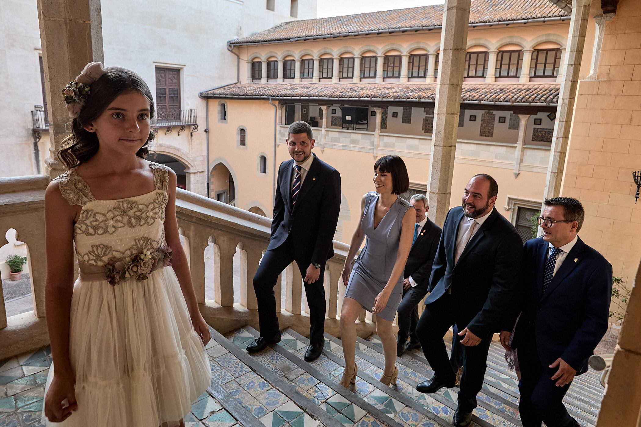 María de Sanfélix entrando en el Palau Ducal acompañada de la ministra, el alcalde y el presidente de la FdF.