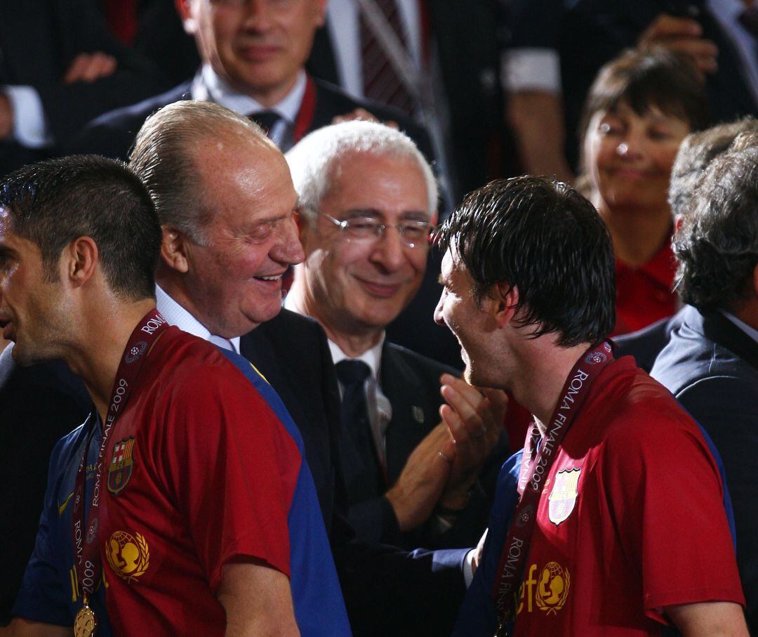 Juan Carlos I y Lionel Messi