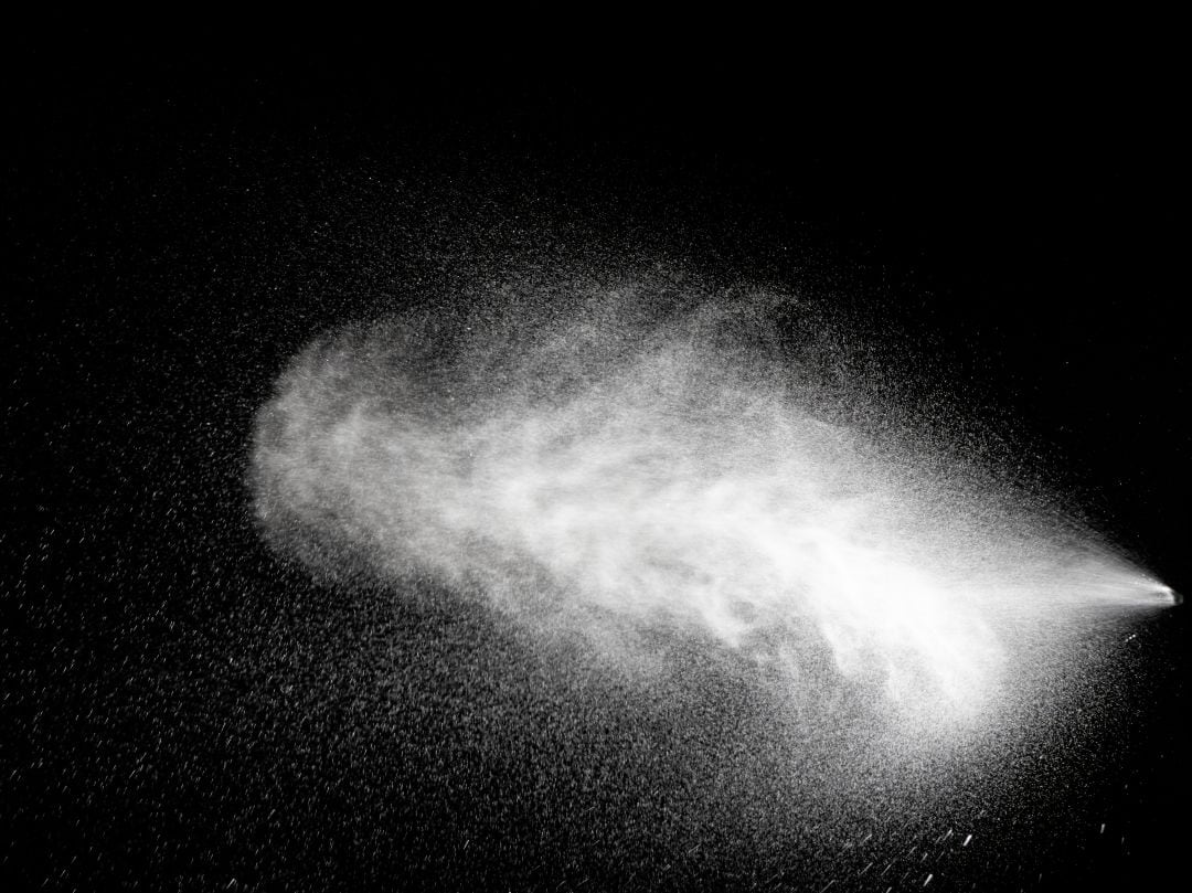 Microgotas en el aire (Imagen de archivo)