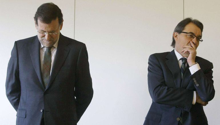 El presidente del Gobierno, Mariano Rajoy, junto al presidente de la Generalitat, Artur Mas, en una imagen de archivo