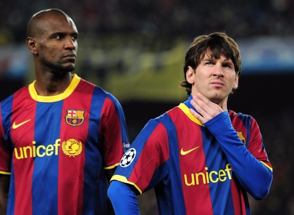 Abidal junto Messi