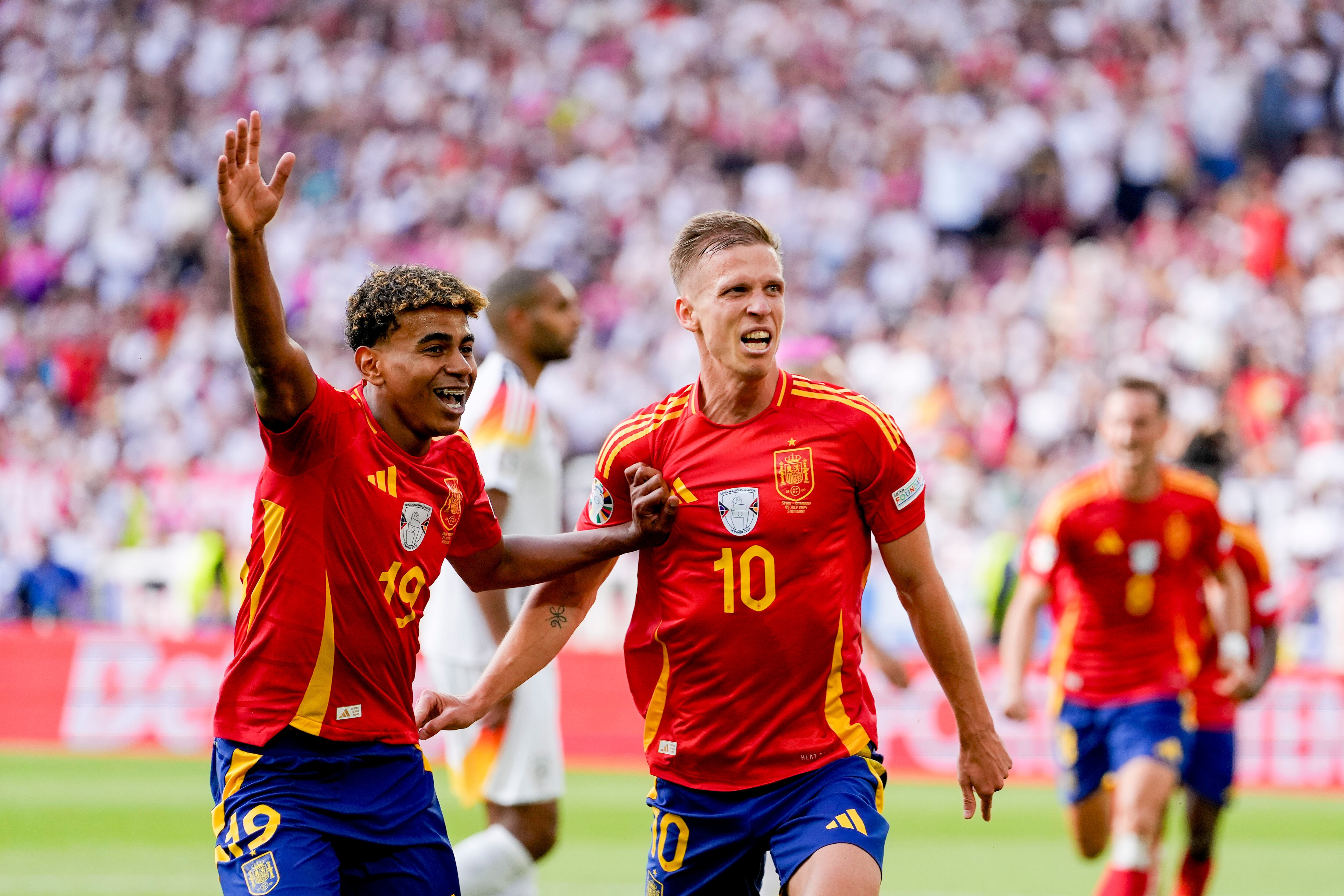 STUTTGART, GERMANY - JULY 5: Lamine Yamal of Spain and Dani Olmo of Spain celebrate after the first goal during the UEFA EURO 2024 quarter-final match between Spain and Germany at Stuttgart Arena on July 5, 2024 in Stuttgart, Germany. (Photo by Alex Gottschalk/DeFodi Images/DeFodi via Getty Images)