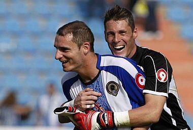 Juan Calatayud junto a Andrija Delibašić, exjugadores del Hércules