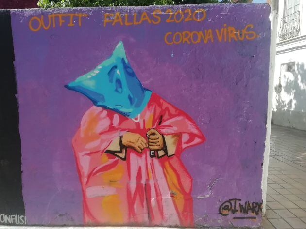 Grafiti que muestra a una de 'las vecinas de València' vestida con bolsas de basura, representando el 'outfit' para las Fallas 2020 cuando estas todavía seguían en pie, en una calle de Benimaclet (València) y firmado por @j.warx en Instagram