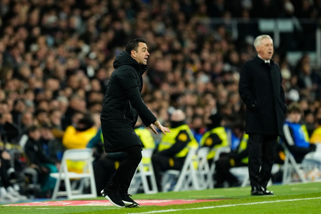 Xavi y Ancelotti, en el partido de ida.