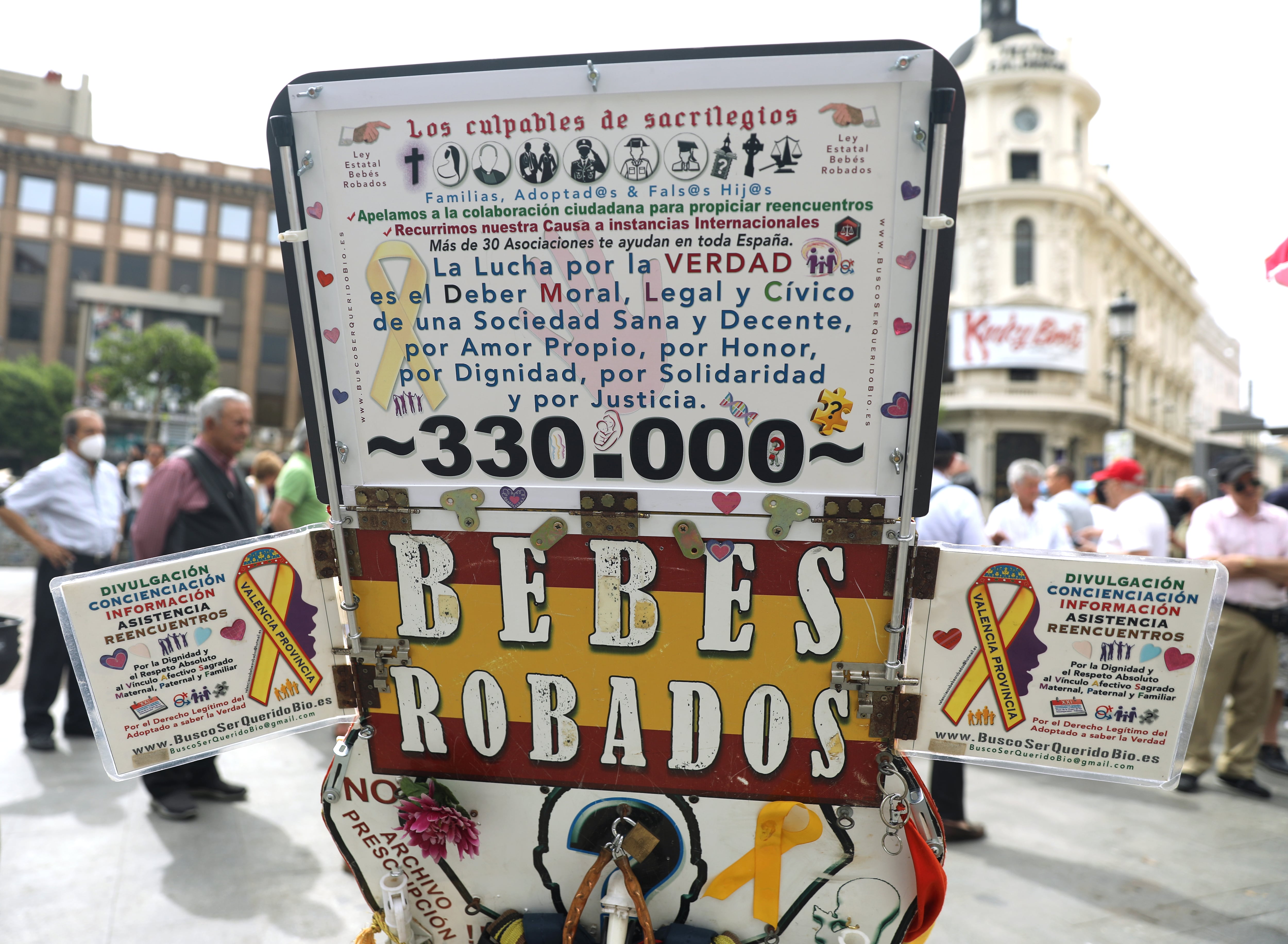 MADRID, SPAIN - MAY 22: A banner with the estimated number of missing babies (330,000) during a rally of victims of baby theft in Spain, at Plaza de Jacinto Benavente, on May 22, 2022, in Madrid, Spain. The Madrid associations &#039;Todos los niños robados son tambien mis niños&#039;, &#039;Adelante Bebes Robados&#039; and &#039;SOS Bebes Robados Madrid&#039; pay tribute to the people who have helped them in the fight to clear up cases of missing newborns. The call claims the objective of achieving the approval of the law on stolen babies so that the victims can have institutional help. (Photo By Isabel Infantes/Europa Press via Getty Images)