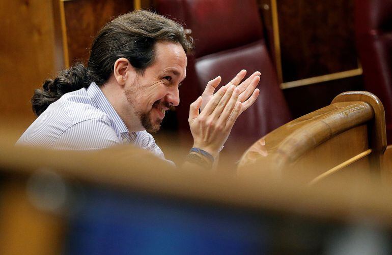 El líder de la formación Podemos, Pablo Iglesias, durante el pleno del Congreso de este martes