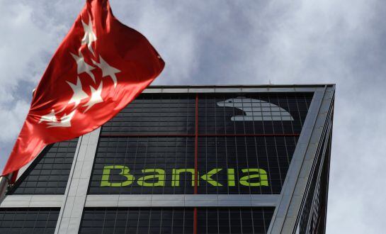 (FILES) A file picture taken on July 18, 2011 shows Spanish bank Bankia&#039;s headquarters in Madrid. Bailed-out Spanish financial giant Bankia misrepresented its accounts ahead of its doomed 2011 stock listing which coincided with suspect buying and selling 