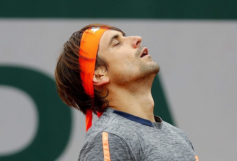 Ferrer se lamenta durante su partido de octavos ante Berdych