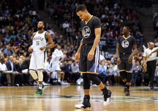 Dec 12, 2015; Milwaukee, WI, USA; Golden State Warriors guard Stephen Curry (30) reacts in the fourth quarter during the game against the Milwaukee Bucks at BMO Harris Bradley Center. The Bucks beat the Warriors 108-95. Mandatory Credit: Benny Sieu-USA TO