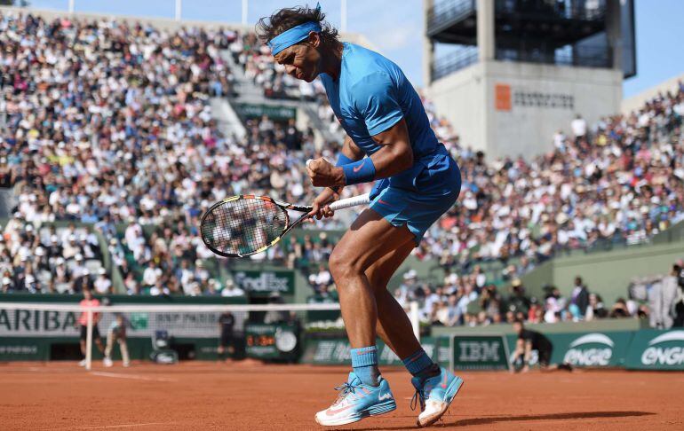 El español Rafa Nadal celebra un punto ganador ante el estadounidense Jack Sock.