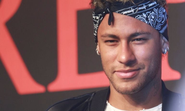 Barcelona soccer player Neymar attends a fashion event in Shanghai, China 