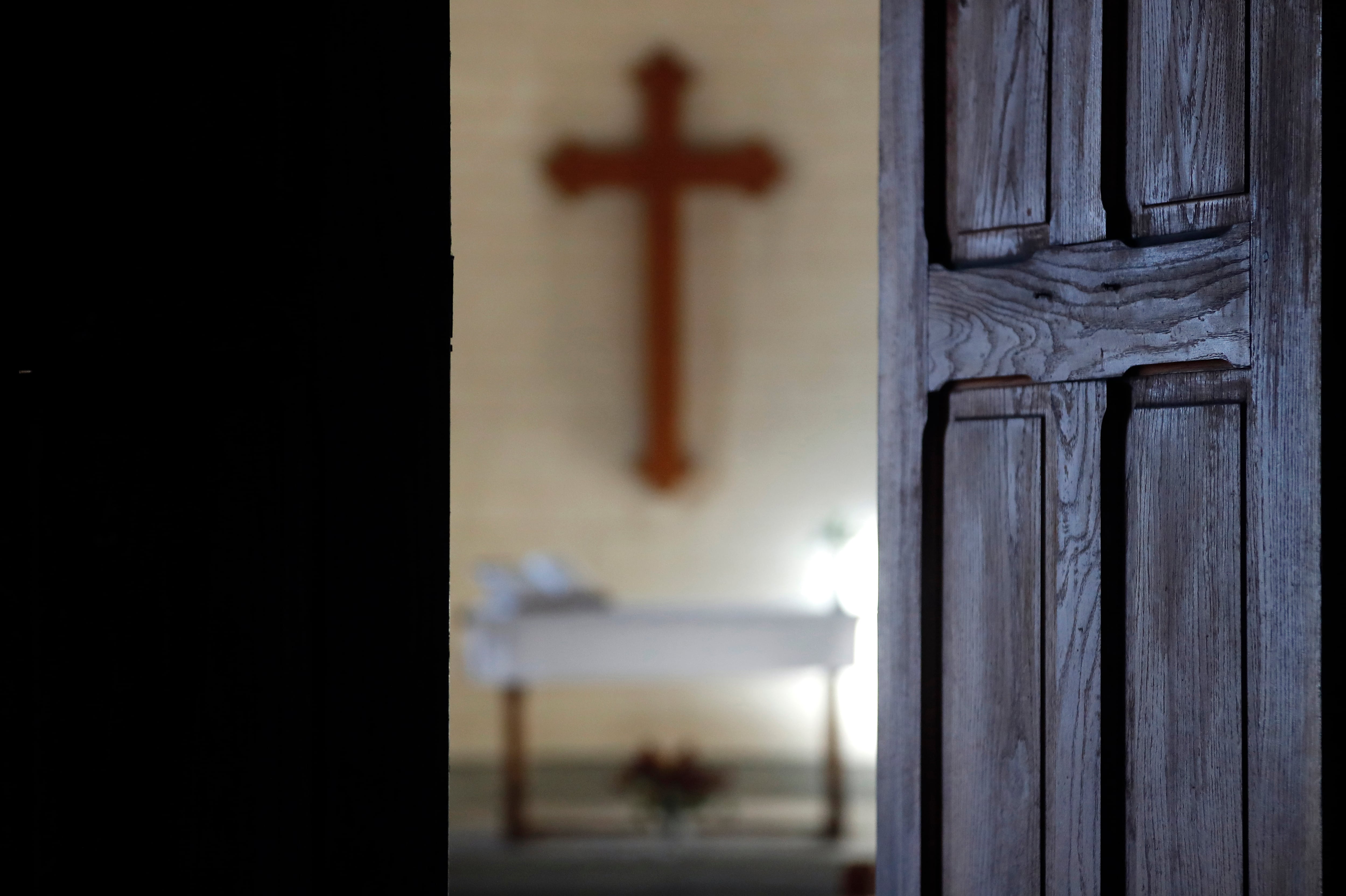 Protestant church.  Altar and christian cross.  France. 