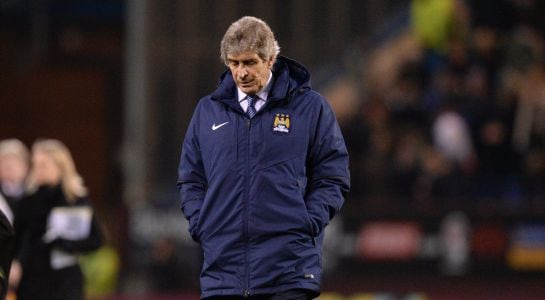 Manchester City&#039;s Chilean manager Manuel Pellegrini leaves after the English Premier League football match between Burnley and Manchester City at Turf Moor in Burnley, north west England, on March 14, 2015. Burnley won the game 1-0. AFP PHOTO / OLI SCARFF