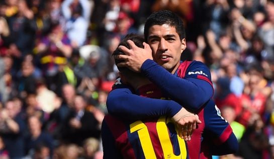 BARCELONA, SPAIN - MARCH 08: Lionel Messi of FC Barcelona celebrates with his teammate Luis Suarez of FC Barcelona after scoring his team&#039;s fourth goal during the La Liga match between FC Barcelona and Rayo Vallecano de Madrid at Camp Nou on March 8, 2015