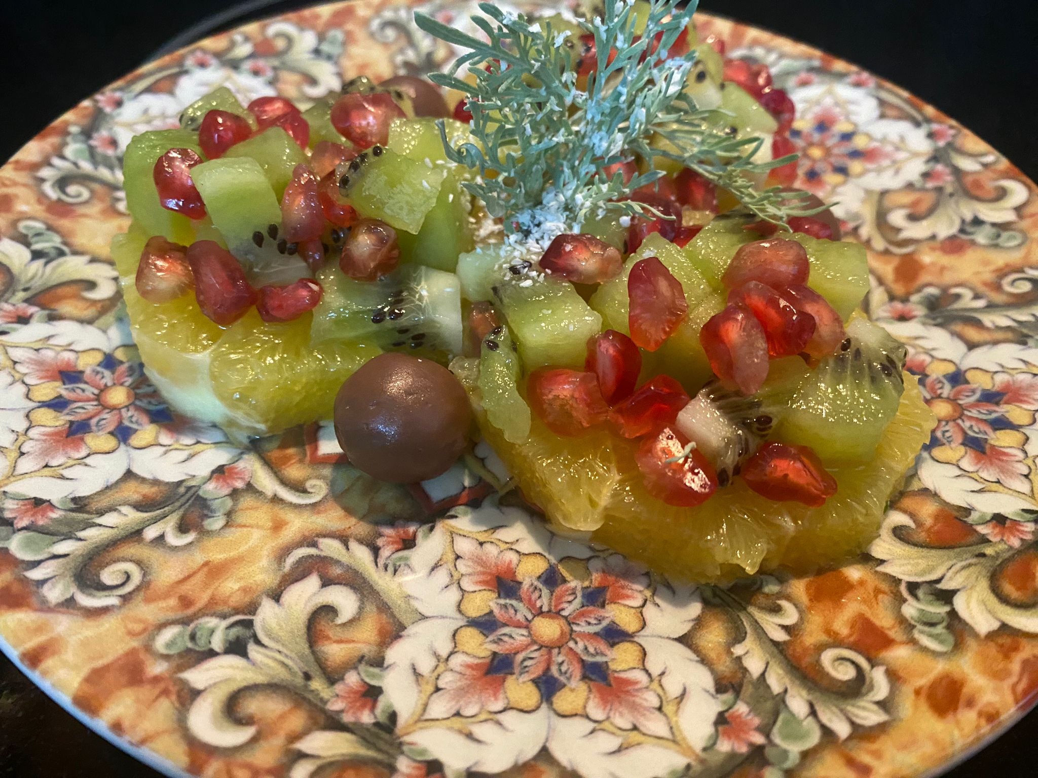 Naranja, kiwi y granada con chocolate.