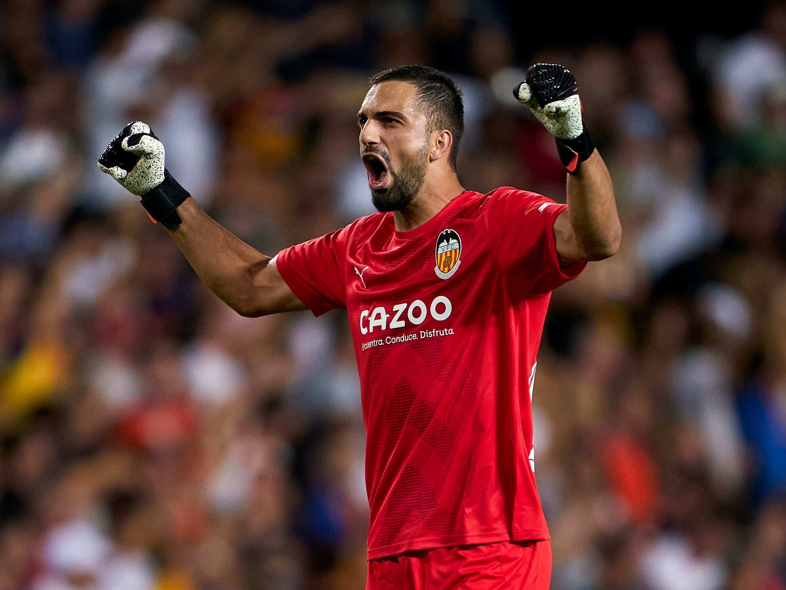Giorgi Mamardashvili of Valencia CF celebrates after the first goal of his team scored by Toni Lato (not in frame) during the LaLiga Santander match between Valencia CF and Getafe CF at Estadio Mestalla on September 04, 2022 in Valencia, Spain. (Photo by Manuel Queimadelos/Quality Sport Images/Getty Images)