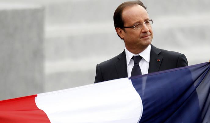 El presidente francés, Françoise Hollande, en el desfile del 14 de Julio en los Campos Eliseos