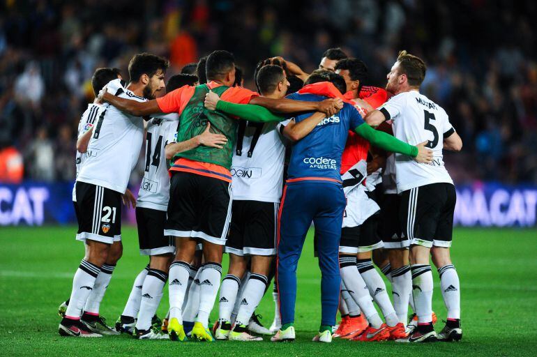 BARCELONA, SPAIN - APRIL 17:  Valencia CF players celebrate after defeating FC Barcelona at the end of the La Liga match between FC Barcelona and Valencia CF at Camp Nou on April 17, 2016 in Barcelona, Spain.  (Photo by David RamosGetty Images)