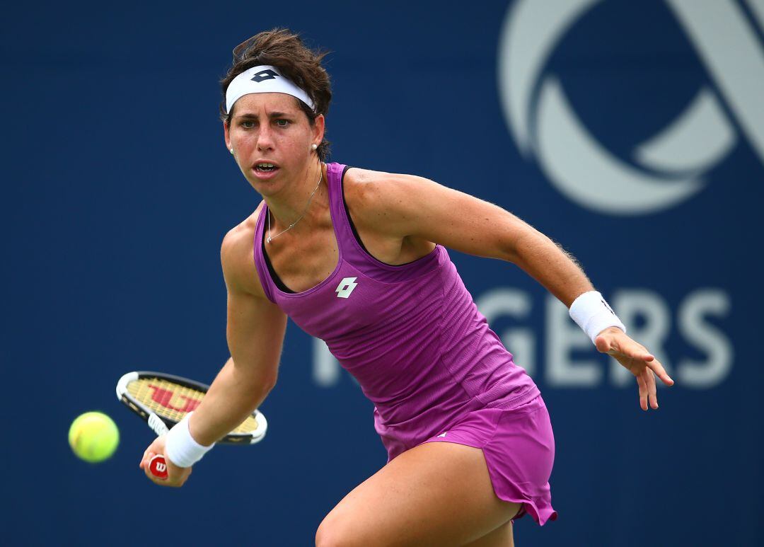 Carla Suárez, durante un partido contra Venus Williams en la Rogers Cup. 