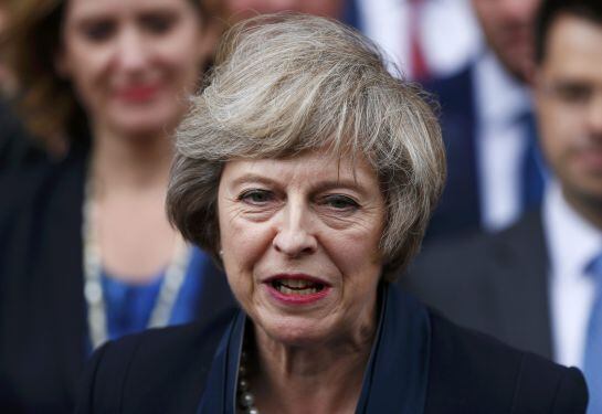 Theresa May speaks to reporters after being confirmed as the leader of the Conservative Party and Britain&#039;s next Prime Minister outside the Houses of Parliament in Westminster, central London, July 11, 2016. REUTERS/Neil Hall