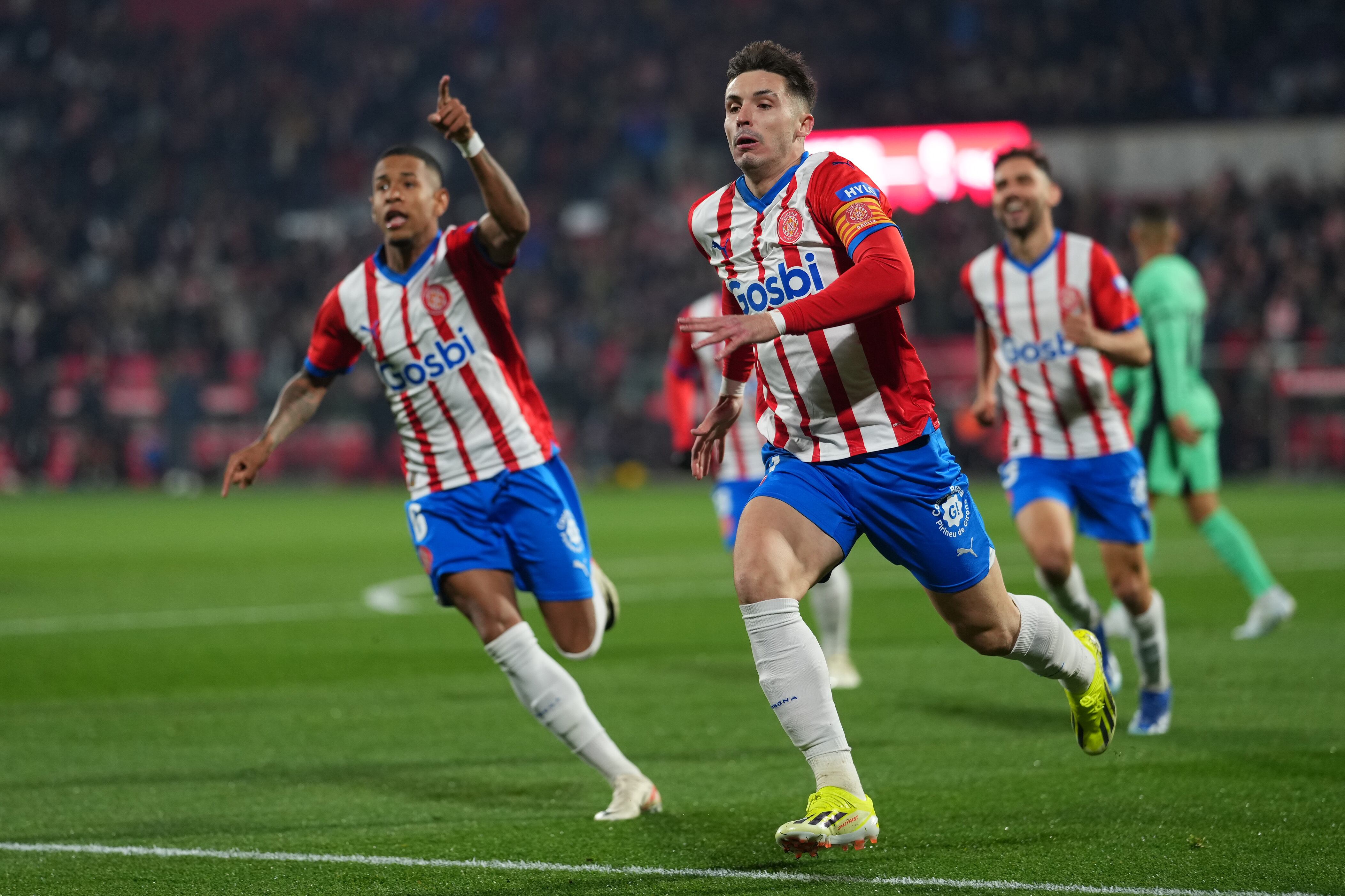GIRONA, SPAIN - JANUARY 03: Valery Fernandez of Girona FC celebrates after scoring their team's first goal during the LaLiga EA Sports match between Girona FC and Atletico Madrid at Montilivi Stadium on January 03, 2024 in Girona, Spain. (Photo by Alex Caparros/Getty Images)