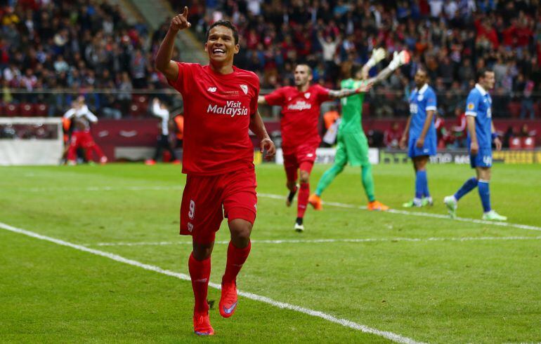 WARSAW, POLAND - MAY 27:  Carlos Bacca of Sevilla celebrates scoring his team&#039;s third goal during the UEFA Europa League Final match between FC Dnipro Dnipropetrovsk and FC Sevilla on May 27, 2015 in Warsaw, Poland.  (Photo by Michael Steele/Getty Images)