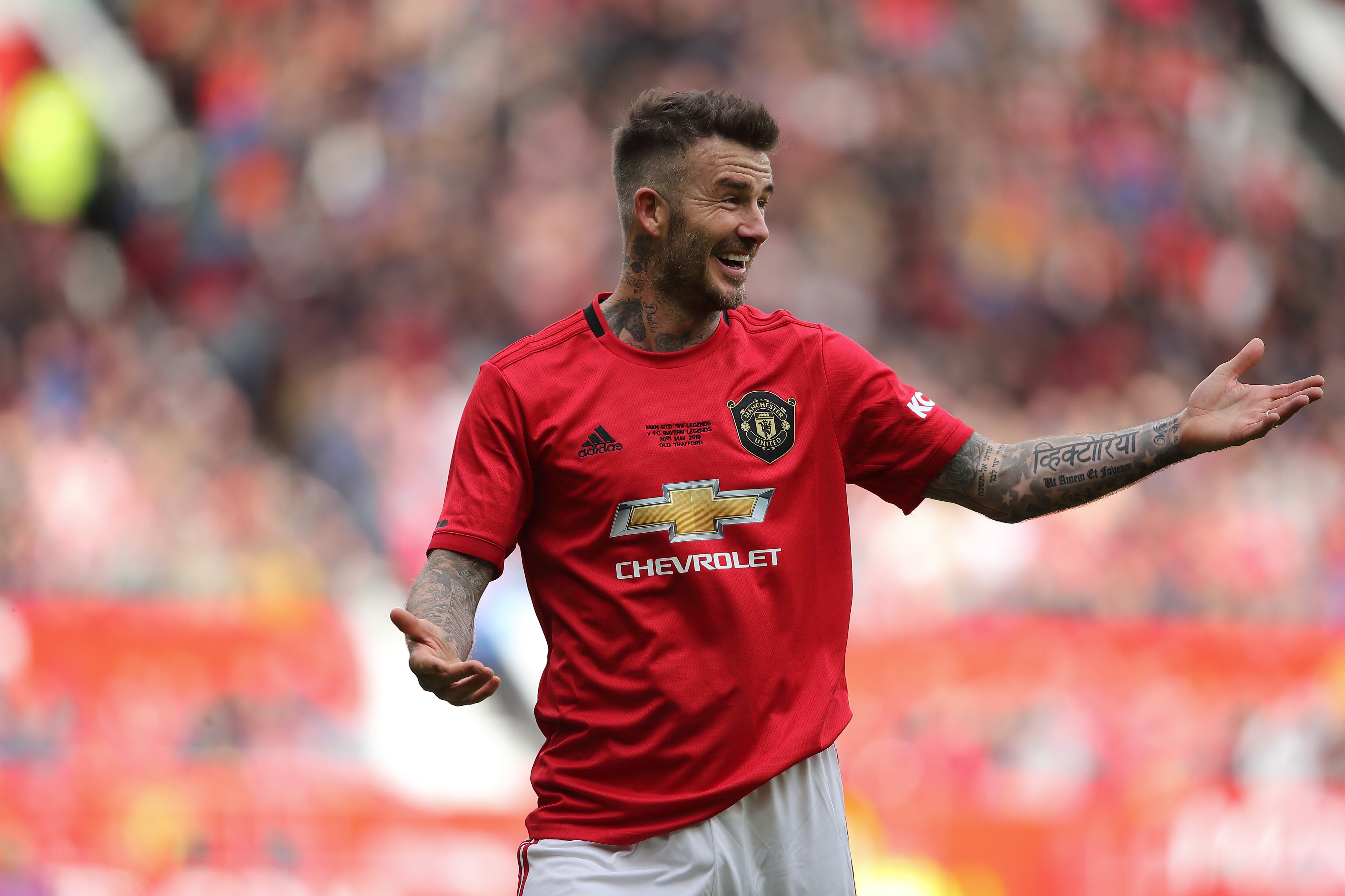 David Beckham, con la camiseta del Manchester United en un partido de leyendas ante el Bayern de Munich