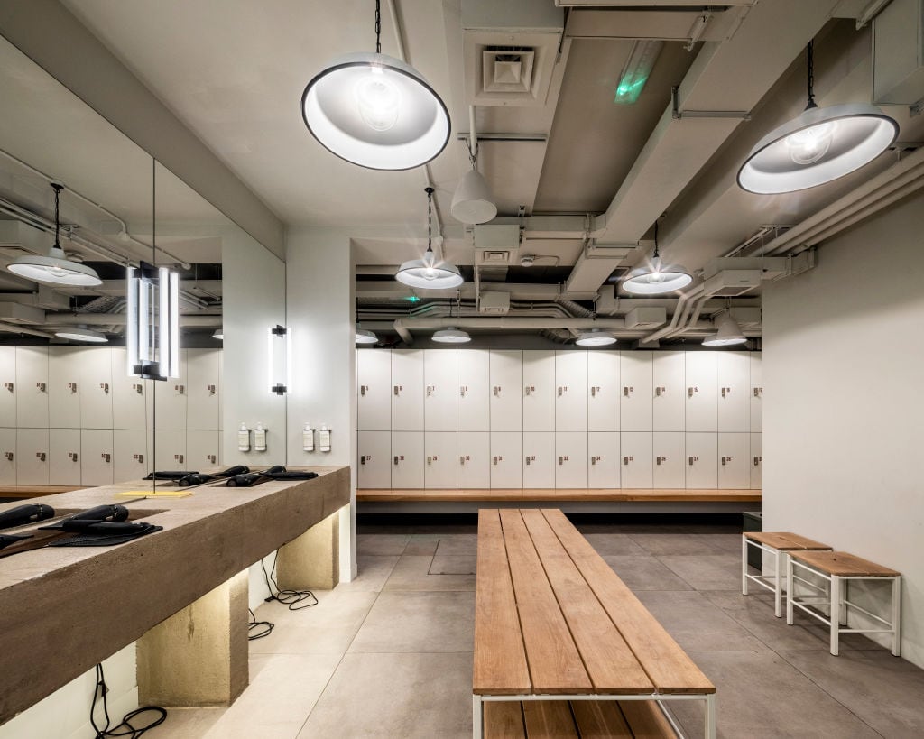 Changing rooms. Core Collective Gym, London, United Kingdom. Architect: Waind Gohil + Potter Architects, 2019. (Photo by: View Pictures/Anthony Coleman/Universal Images Group via Getty Images)