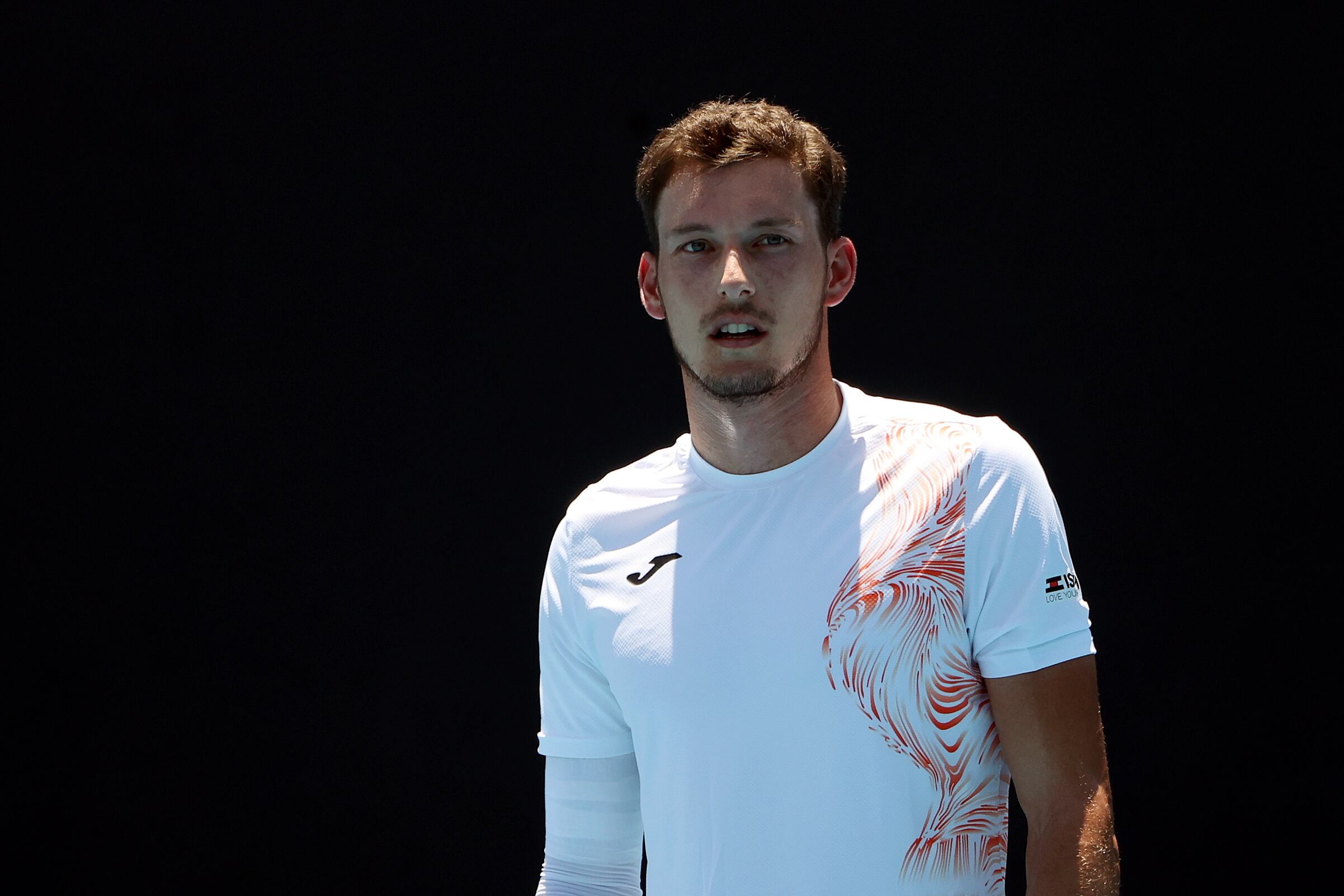 Melbourne (Australia), 17/01/2023.- Pablo Carreno Busta of Spain reacts against Pedro Cachin of Argentina during their first round match at the Australian Open tennis tournament in Melbourne, Australia, 17 January 2023. (Tenis, Abierto, España) EFE/EPA/FAZRY ISMAIL
