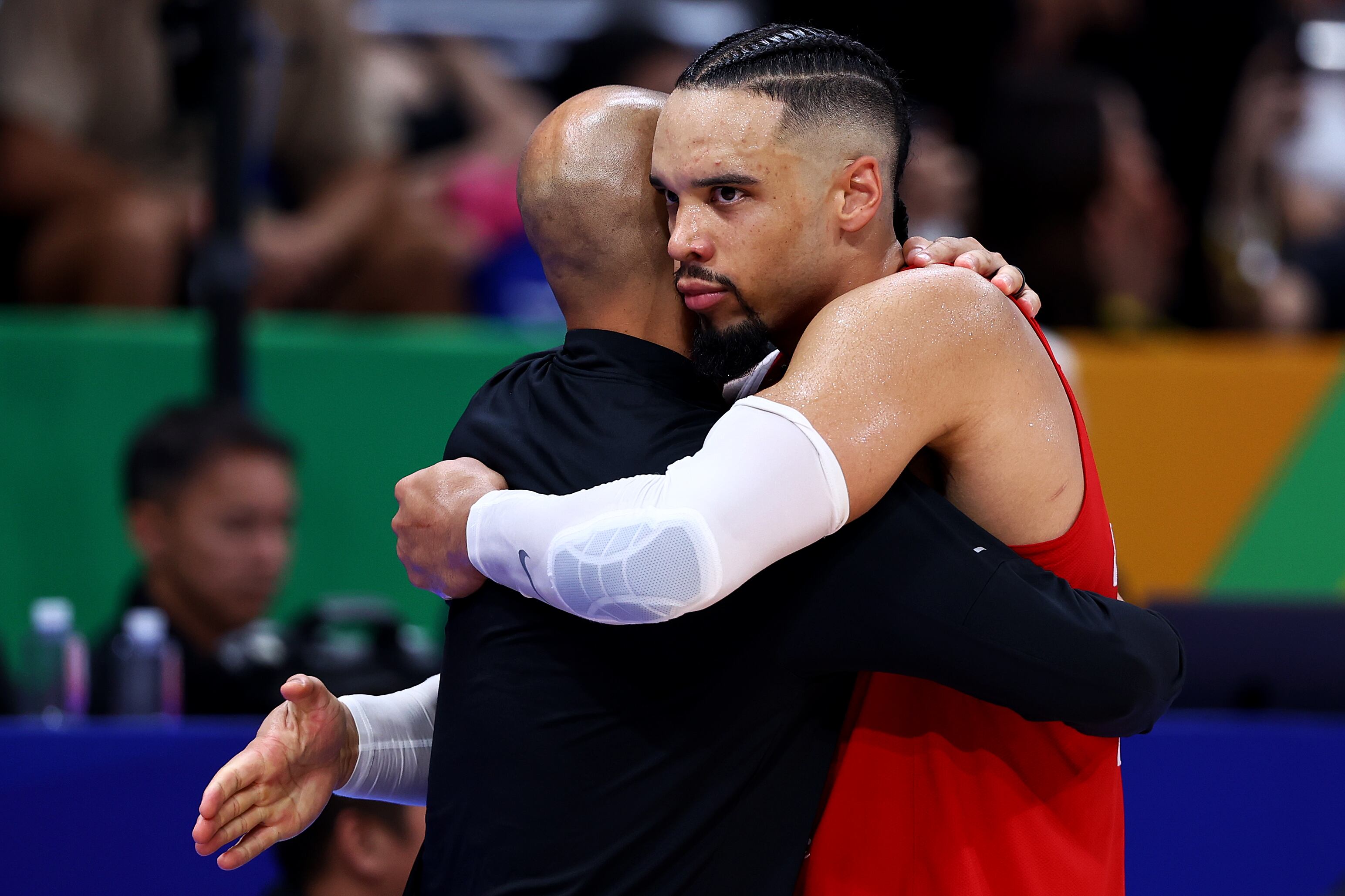MANILA, PHILIPPINES - SEPTEMBER 10: Head coach Jordi Fernandez and Dillon Brooks #24 of Canada celebrate after the FIBA Basketball World Cup 3rd Place game victory over the United States at Mall of Asia Arena on September 10, 2023 in Manila, Philippines. Canada won 127-118 in overtime. (Photo by Yong Teck Lim/Getty Images)