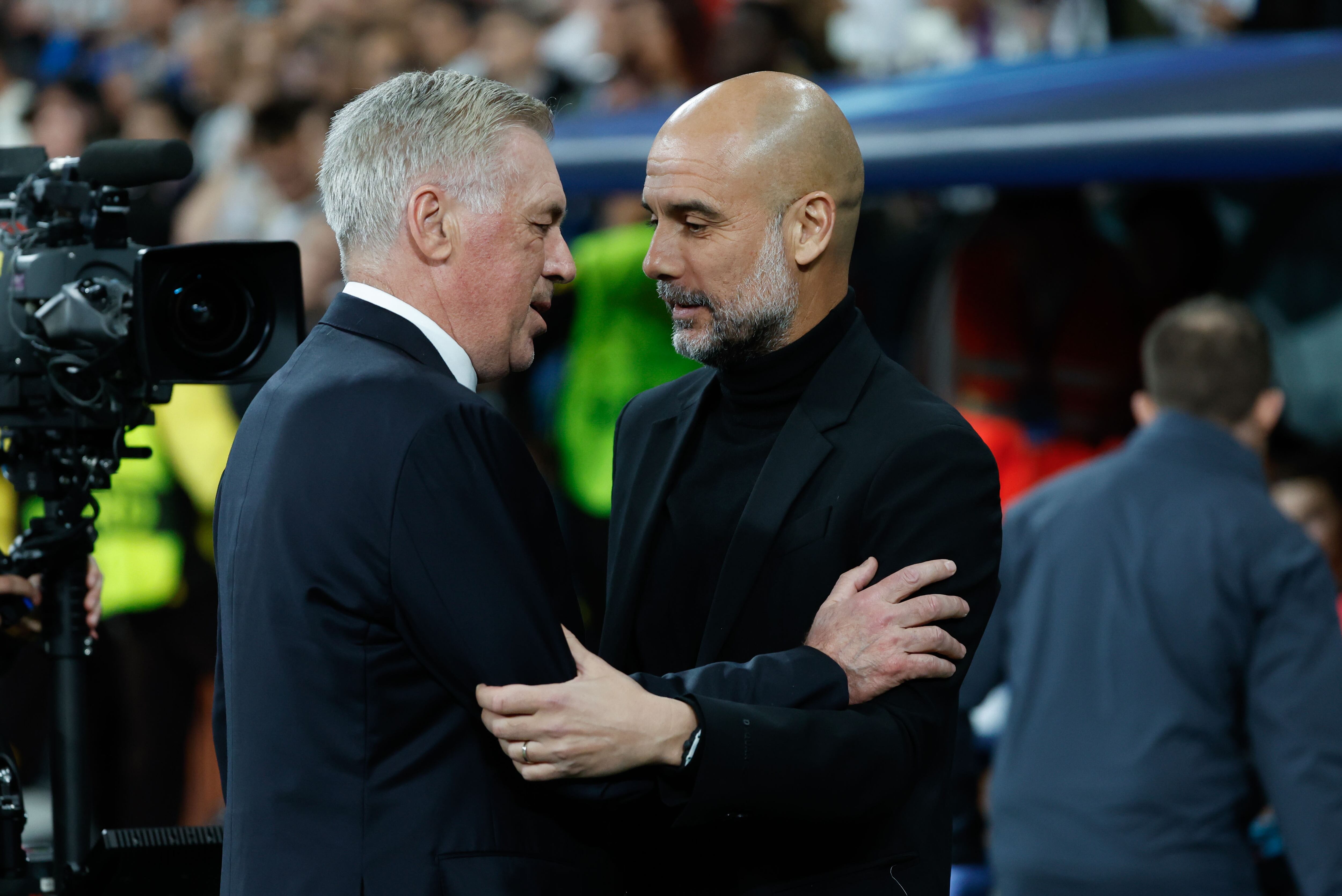 Los técnicos del Real Madrid y Manchester City, Carlo Ancelotti y Pep Guardiola. EFE / Juanjo Martín.