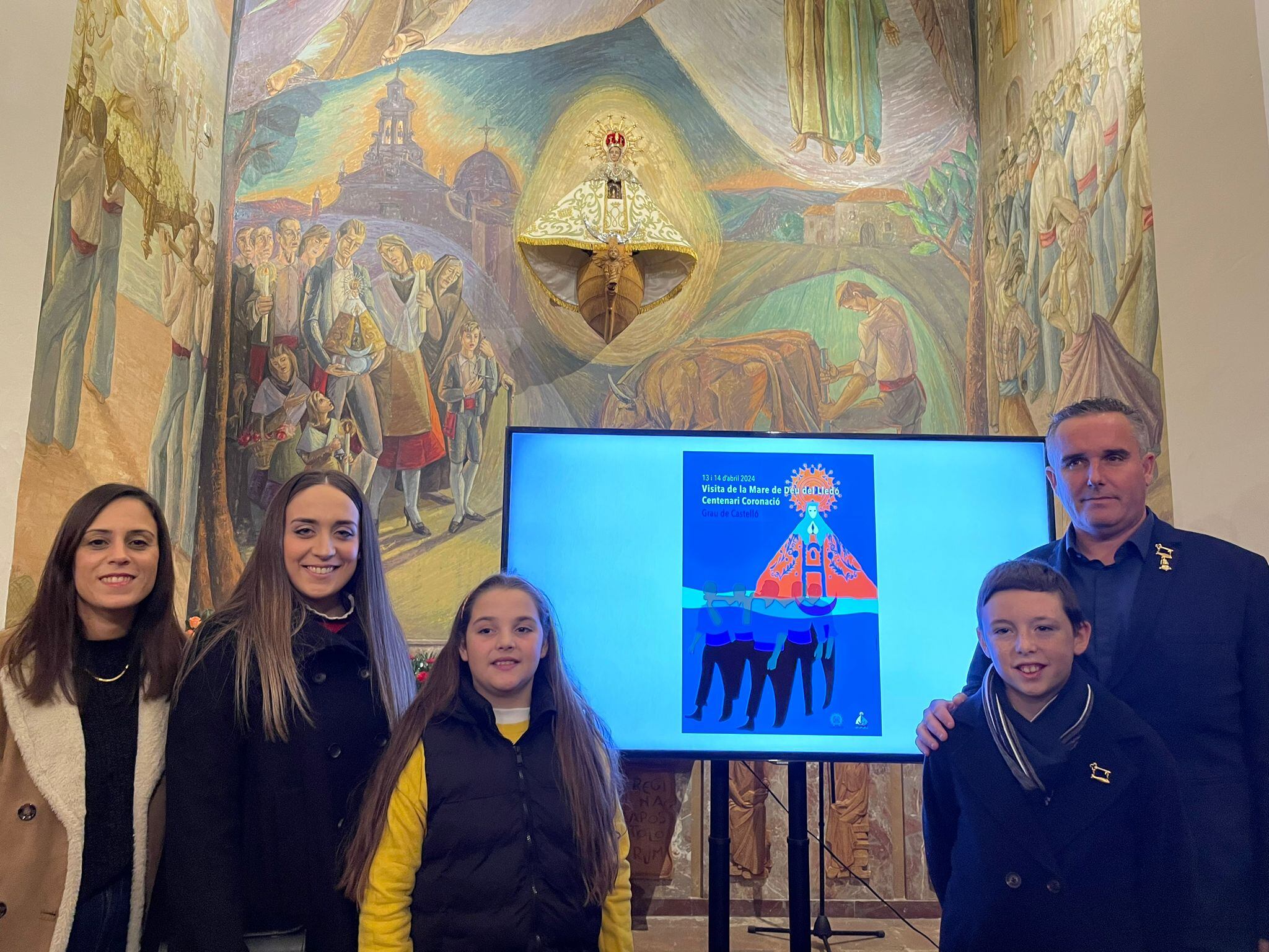 El Grao acoge la presentación del cartel de la visita de la Mare de Déu del Lledó al distrito marítimo en el centanario de la coronación