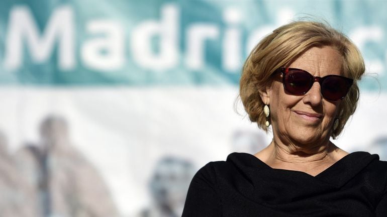 (FILES) A file picture taken on May 20, 2015 shows Ahora Madrid citizen platform&#039;s candidate for mayor of Madrid, Manuela Carmena, taking part in an electoral campaign meeting in Madrid. The candidate Manuela Carmena, emerging from the social protest move