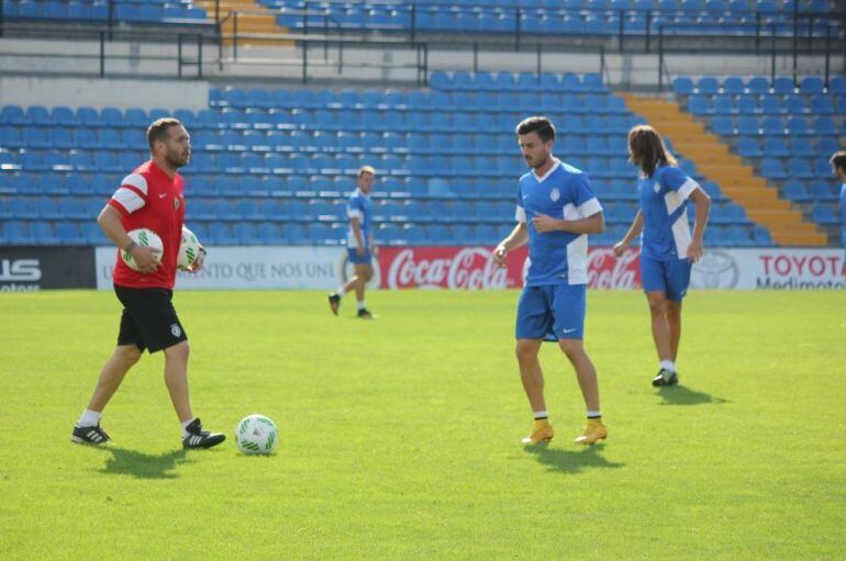 Luis García Tevenet, entrenador del Hércules CF, junto a José Luis Miñano