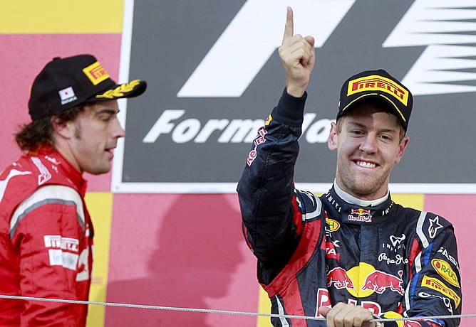 El alemán celebra en el podio de Suzuka la consecución de su segundo Mundial de pilotos de Fórmula 1.