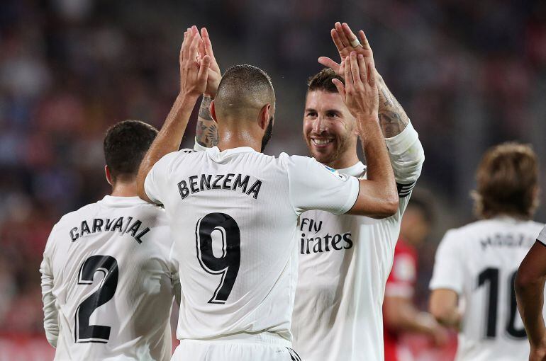 Soccer Football - La Liga Santander - Girona v Real Madrid - Montilivi, Girona, Spain - August 26, 2018 Real Madrid's Karim Benzema celebrates scoring their fourth goal with Sergio Ramos