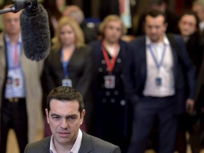 Greek Prime Minister Alexis Tsipras gives a statement after a European Union leaders summit in Brussels, early March 20, 2015. Tsipras said on Friday he was more optimistic after three hours of talks with leaders of Germany, France and European Union inst