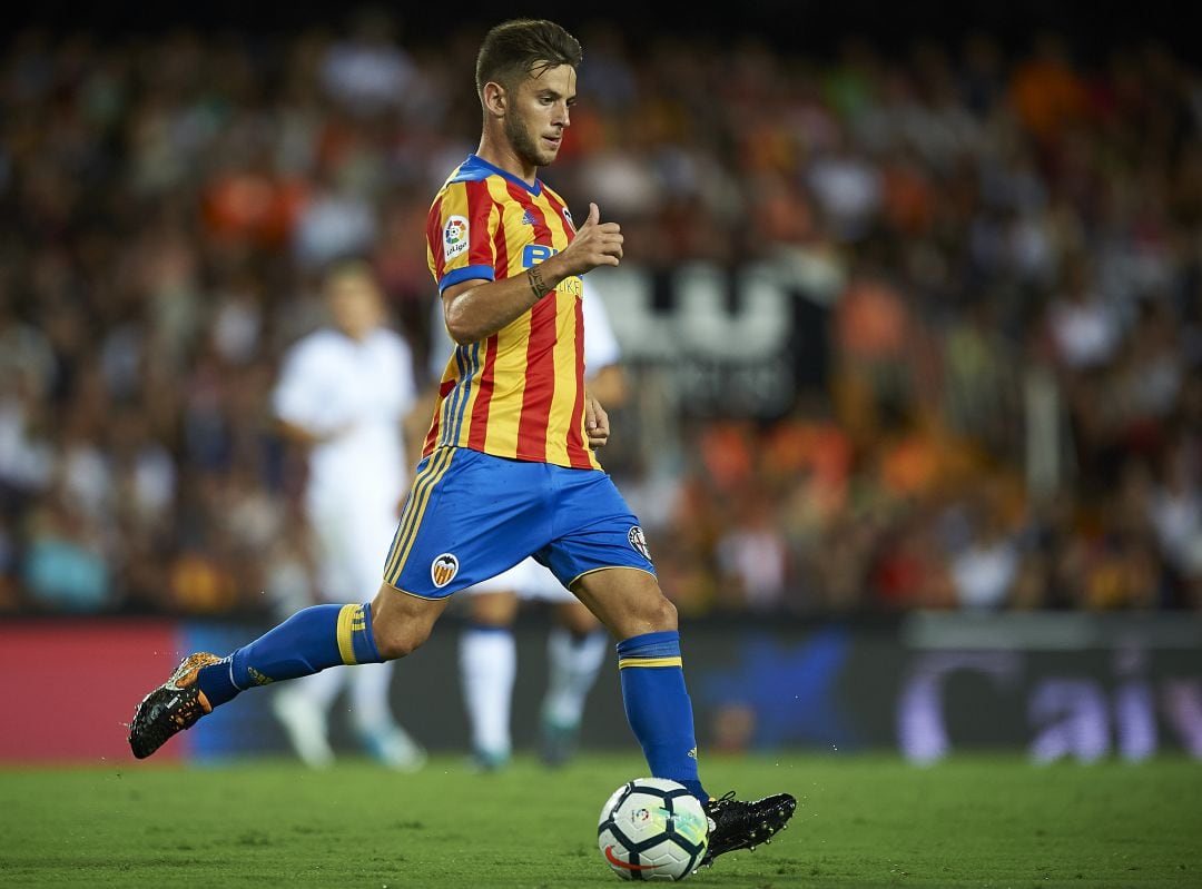 Medrán, jugando con el Valencia