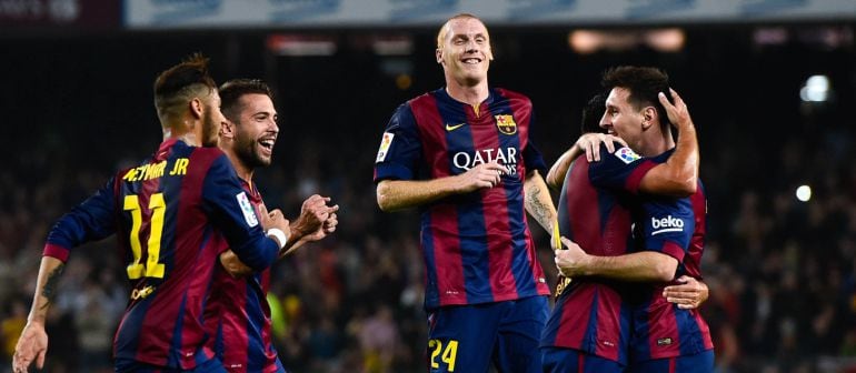 Jugadores del Barcelona celebran un gol ante el Sevilla.