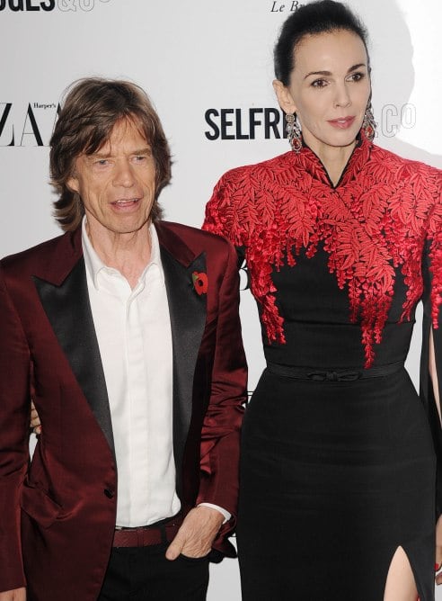 Mick Jagger y L&#039;Wren Scott a su llegada a los premios de la revista Harpers Bazaar en noviembre de 2013