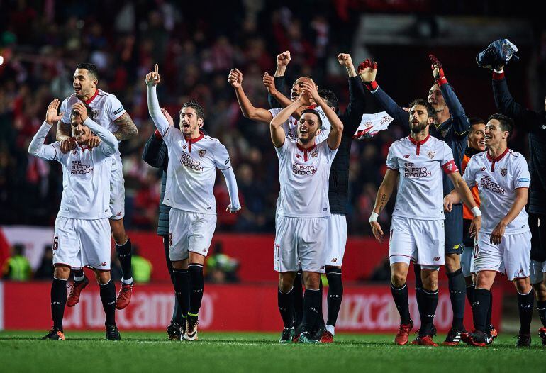 Adil Rami, Victor Machin Perez &quot;Vitolo&quot;,  Stevan Jovetic and Sergio Escudero of Sevilla FC celebrates after winning the match against Real Madrid CF during the La Liga match between Sevilla FC and Real Madrid CF at Estadio Ramon Sanchez Pizjuan on January