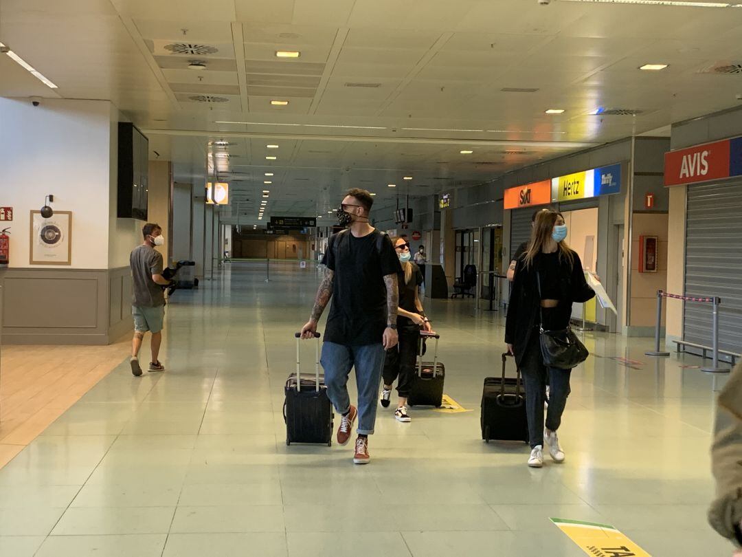 Turistas en el aeropuerto