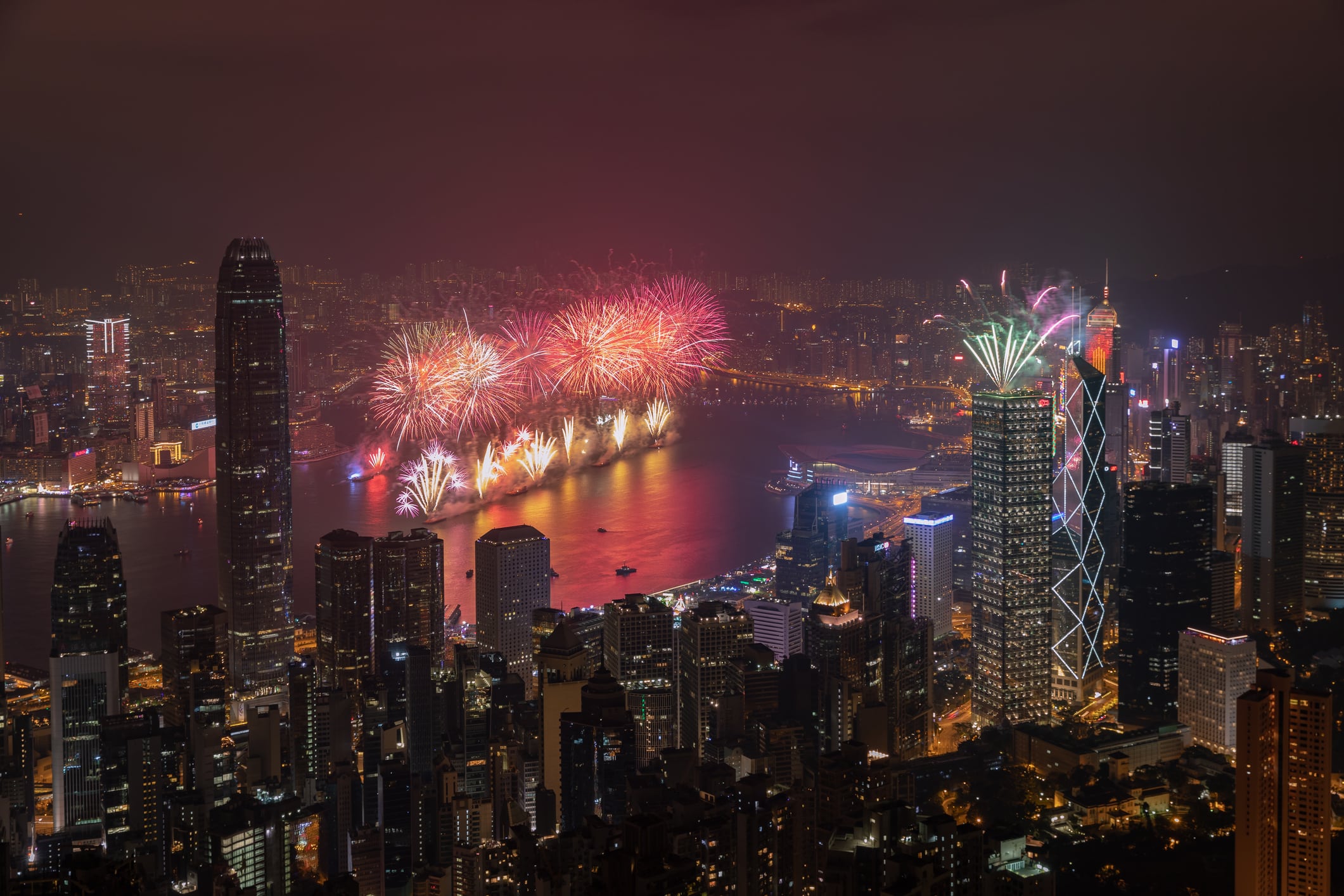 hong kong city night cityscape with firework