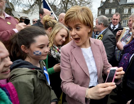 PORTREE, SCOTLAND - MAY 02: First Minister and leader of the SNP Nicola Sturgeon visits Portree on the Isle of Skye by helicopter as she campaigns on May 2, 2015 in Portree, Scotland. As she continued her helicopter tour of Scotland, First Minister Nicola